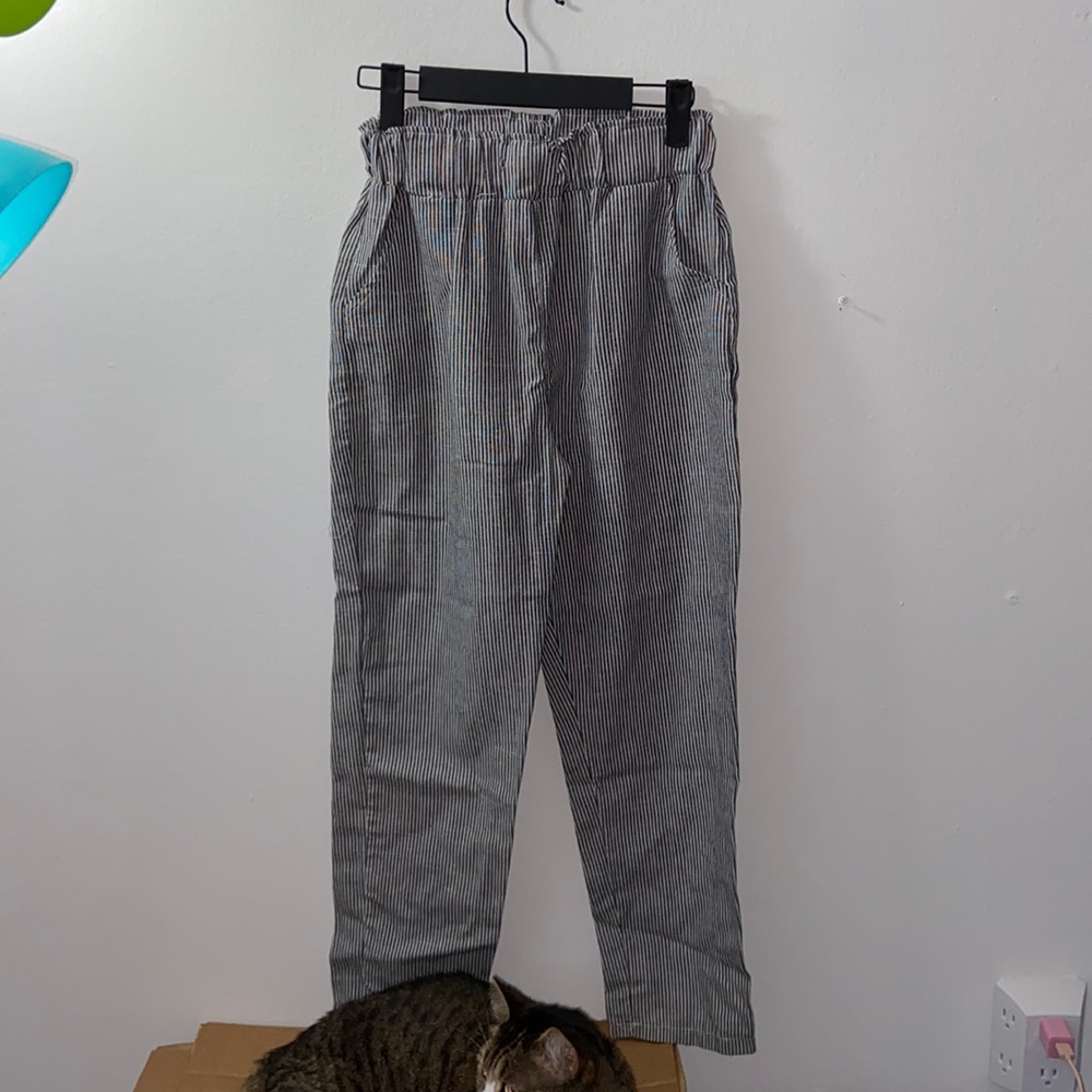 Black and white striped trousers